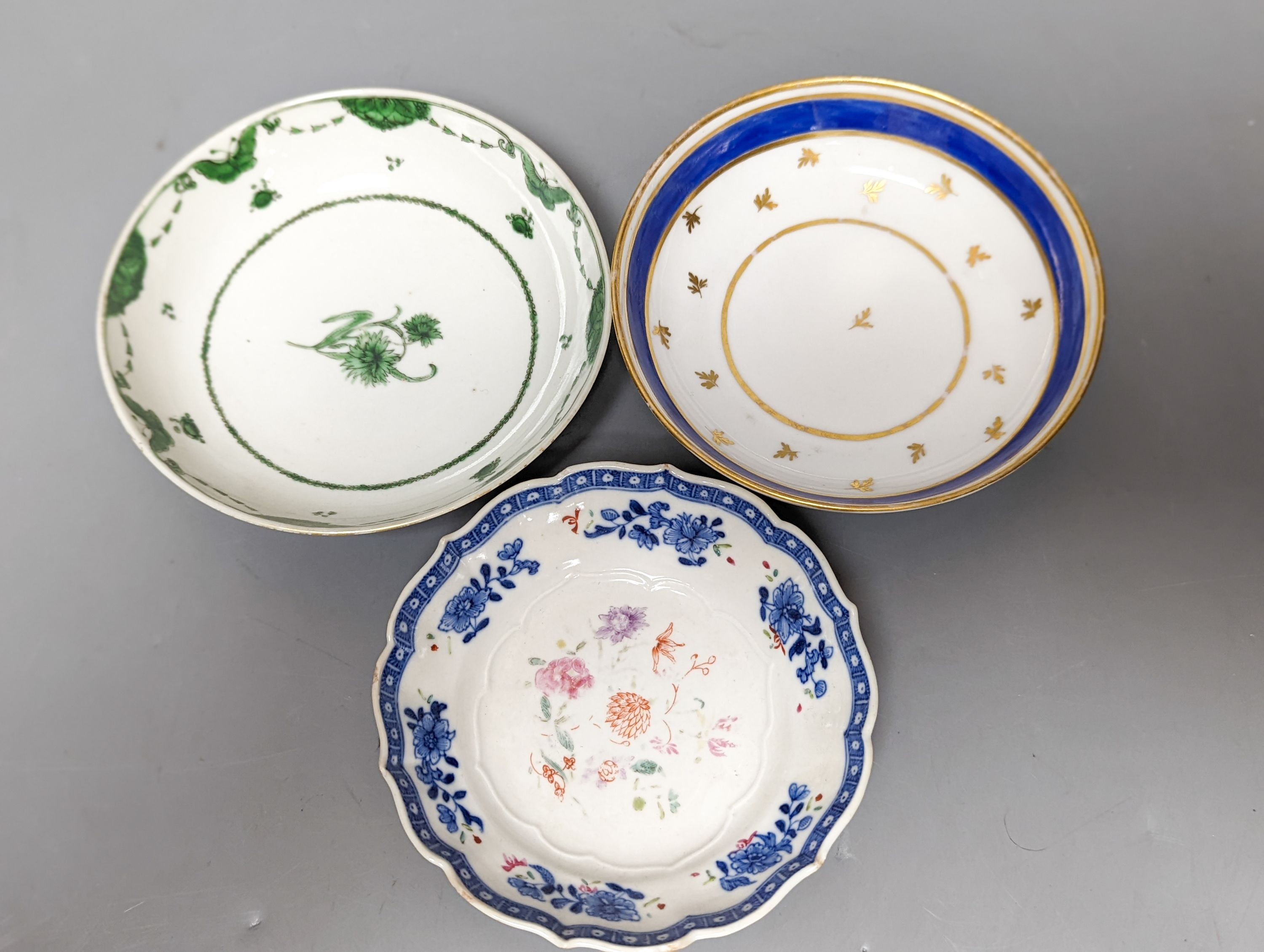 Two 18th century Chinese tea bowls, a 19th century German coffee can and saucer, a Spode coffee can and another